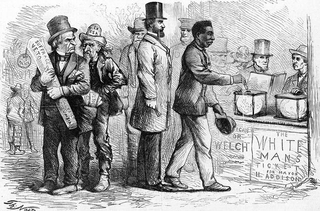 1867. március, Thomas Nast amerikai karikaturista Harper's Weekly című politikai karikatúrája, amely egy afro-amerikait ábrázol férfi, aki a Georgetown-i választások során egy urnába adja a szavazatát, miközben Andrew Jackson és mások nézik mérgesen.