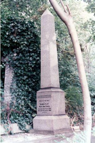 Kő obeliszk egy kertben, amelyen Eliot emlékére felirat szerepel